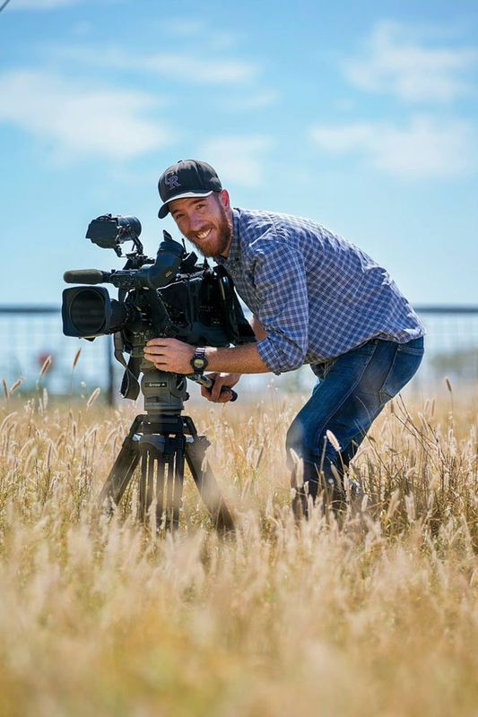 Tom Pawson with Camera in Grass