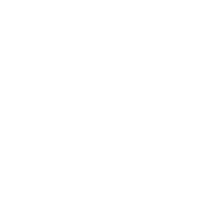 A person holds a white rectangular sign with the handwritten message, 