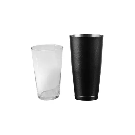 A Glass and A Shaker Are Sitting Next to Each Other on A White Background — Commercial Kitchens Direct in Unanderra, NSW