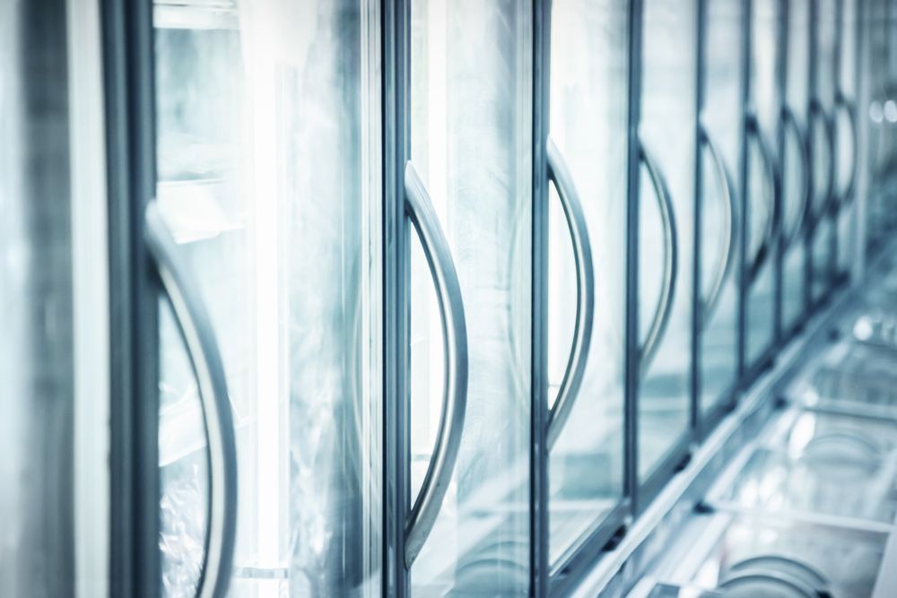 A Dishwasher Filled With Plates, Cups, and Glasses — Commercial Kitchens Direct in Wollongong, NSW
