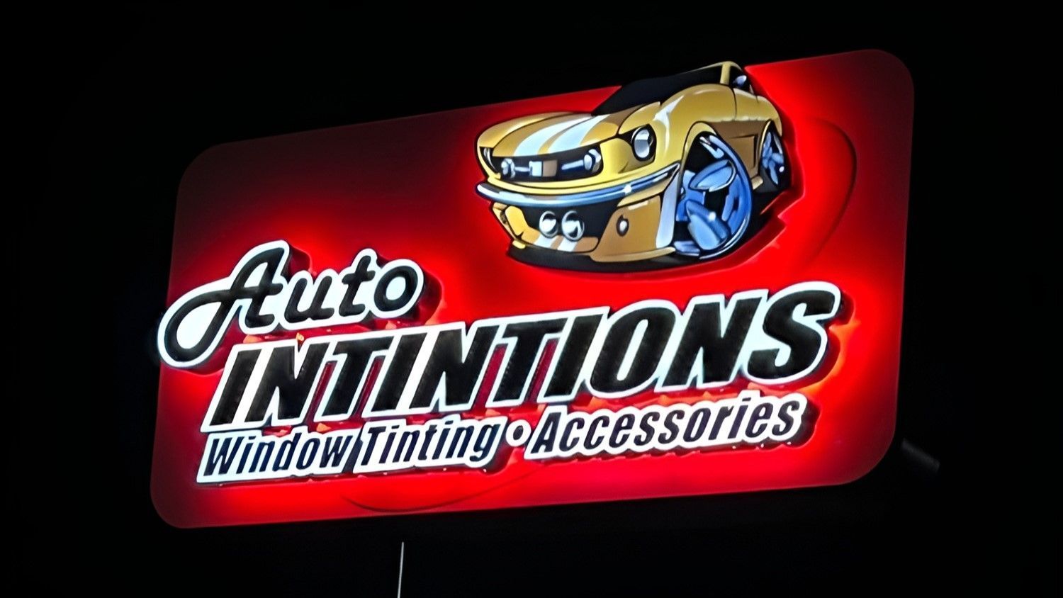 A sign for auto intentions window and tinting accessories