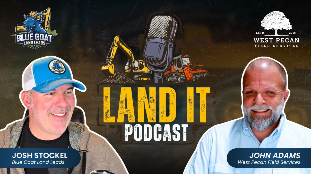 Two men smiling, podcast hosts, next to the Land It podcast logo, with construction equipment and microphones.