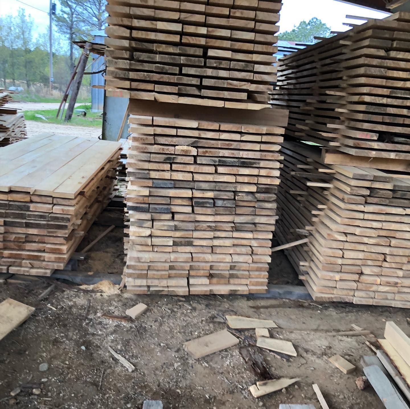 A pile of wooden boards stacked on top of each other