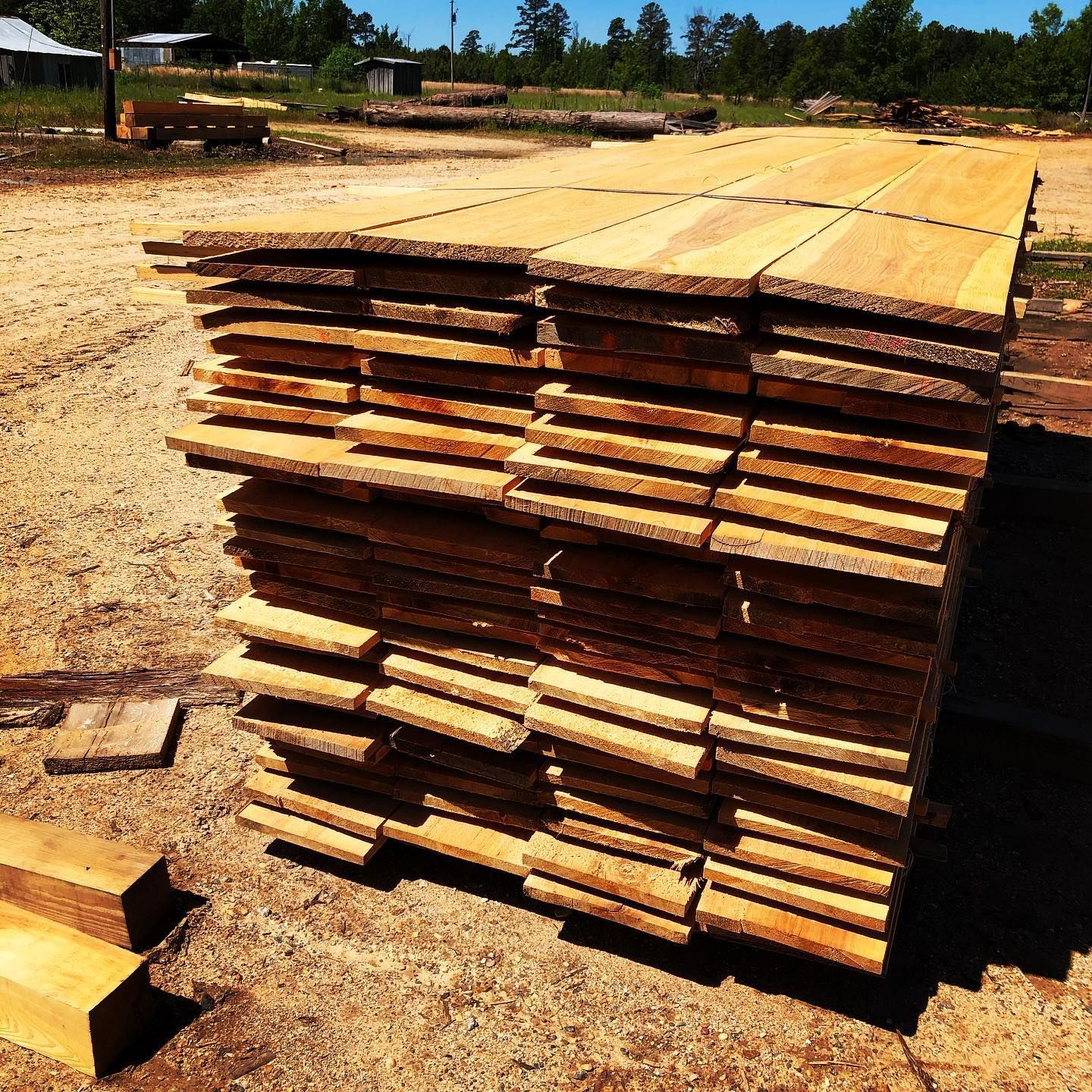 A pile of wood is stacked on top of each other