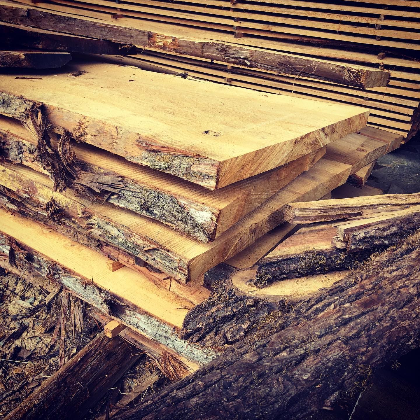 A pile of wood is stacked on top of each other