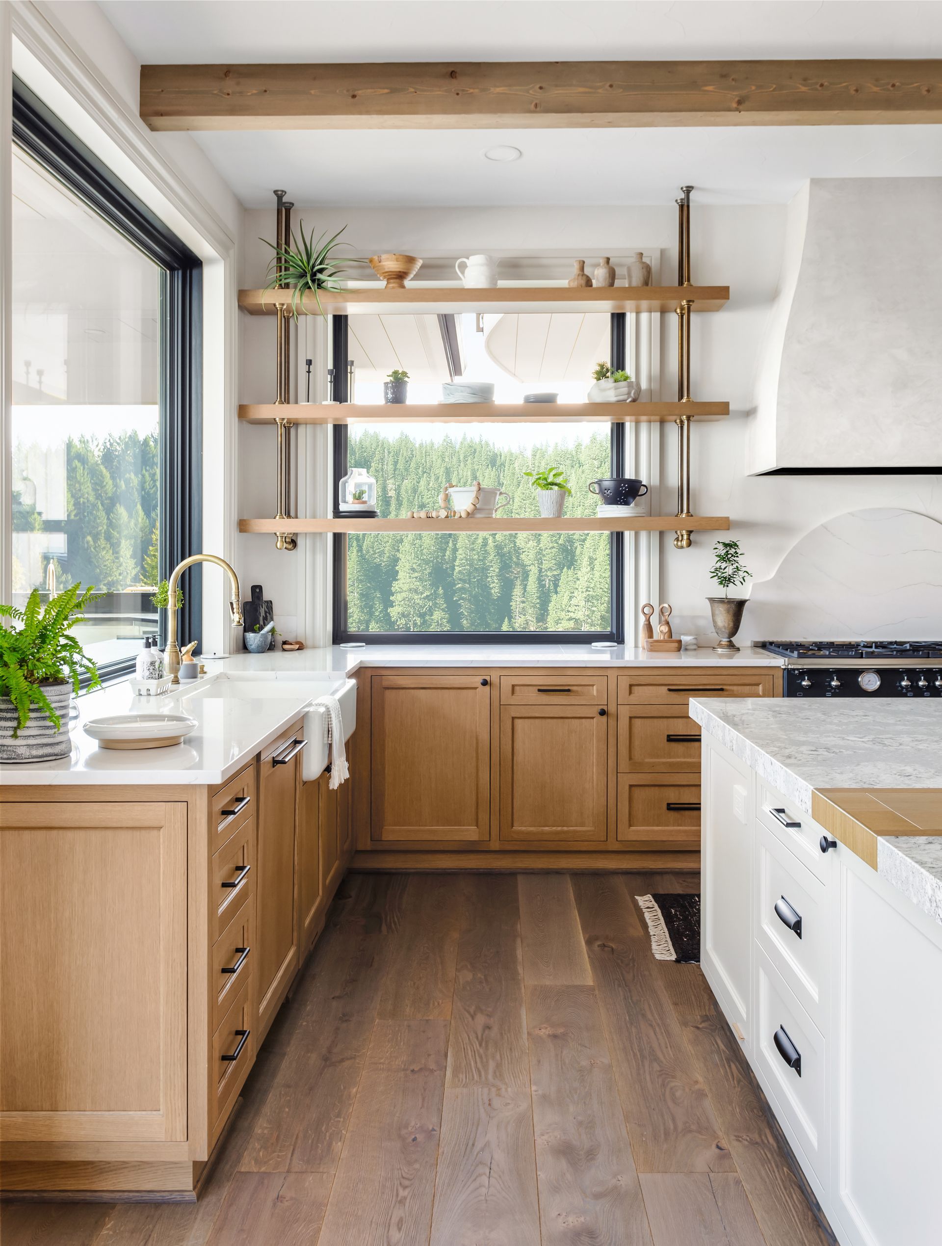 A kitchen with wooden cabinets and white counter tops