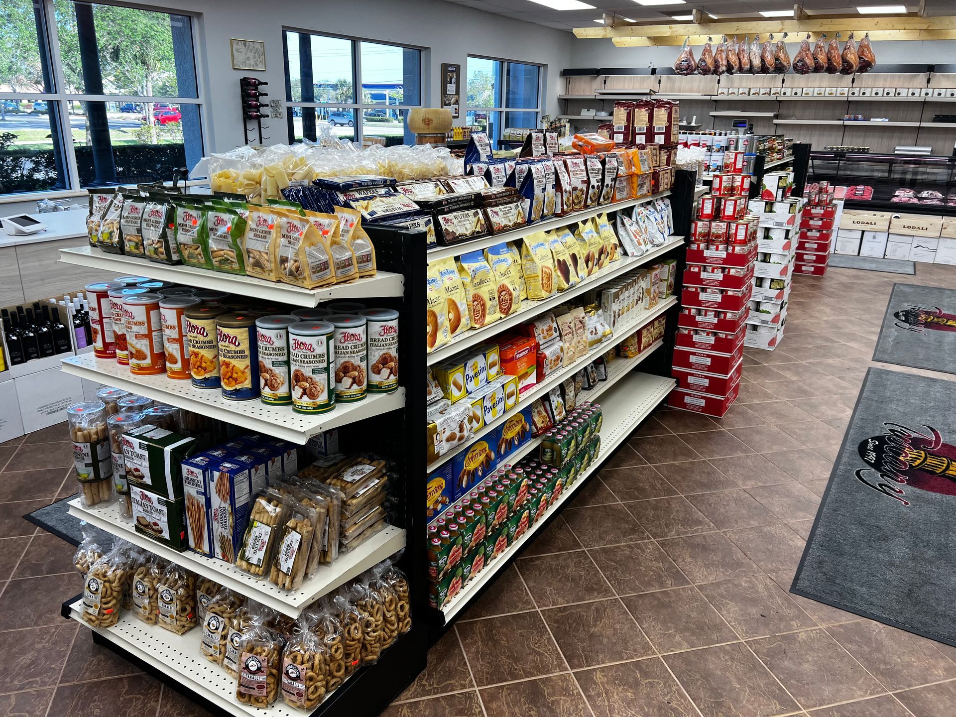 A grocery store aisle filled with lots of food items