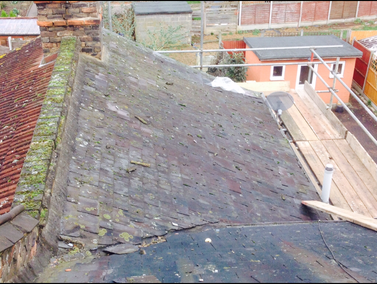 before picture of a slanting roof