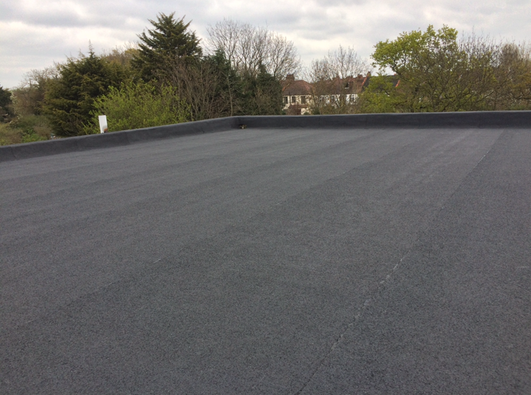After picture of a flat roof