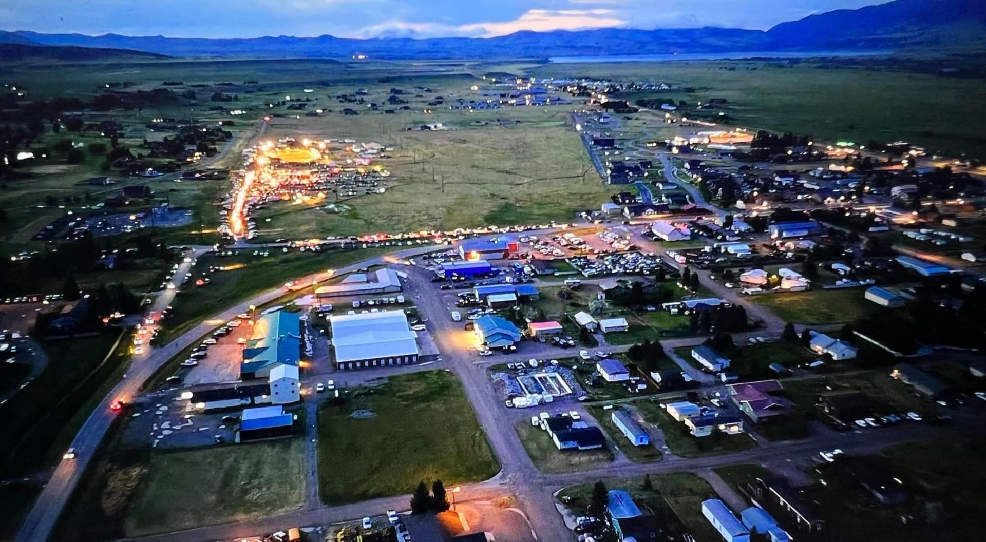 Aerial view of a town at dusk.