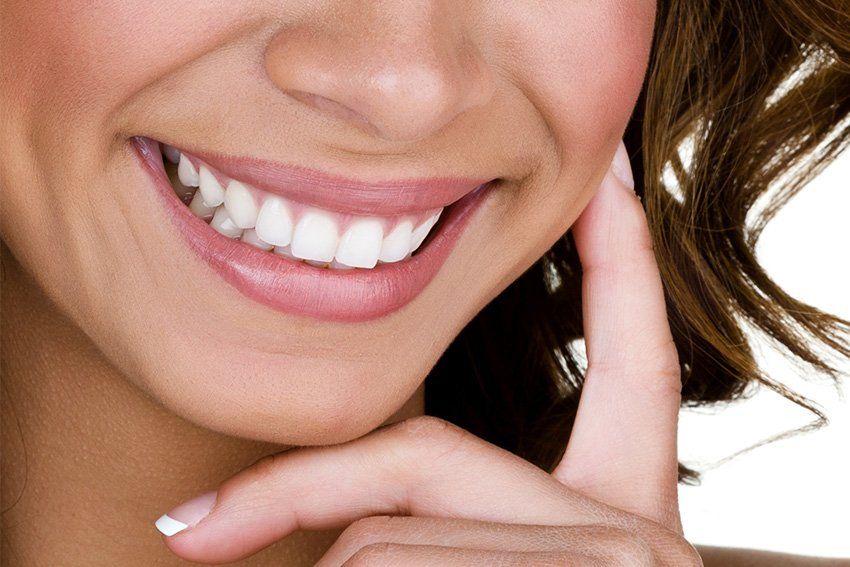Close up of young woman smiling