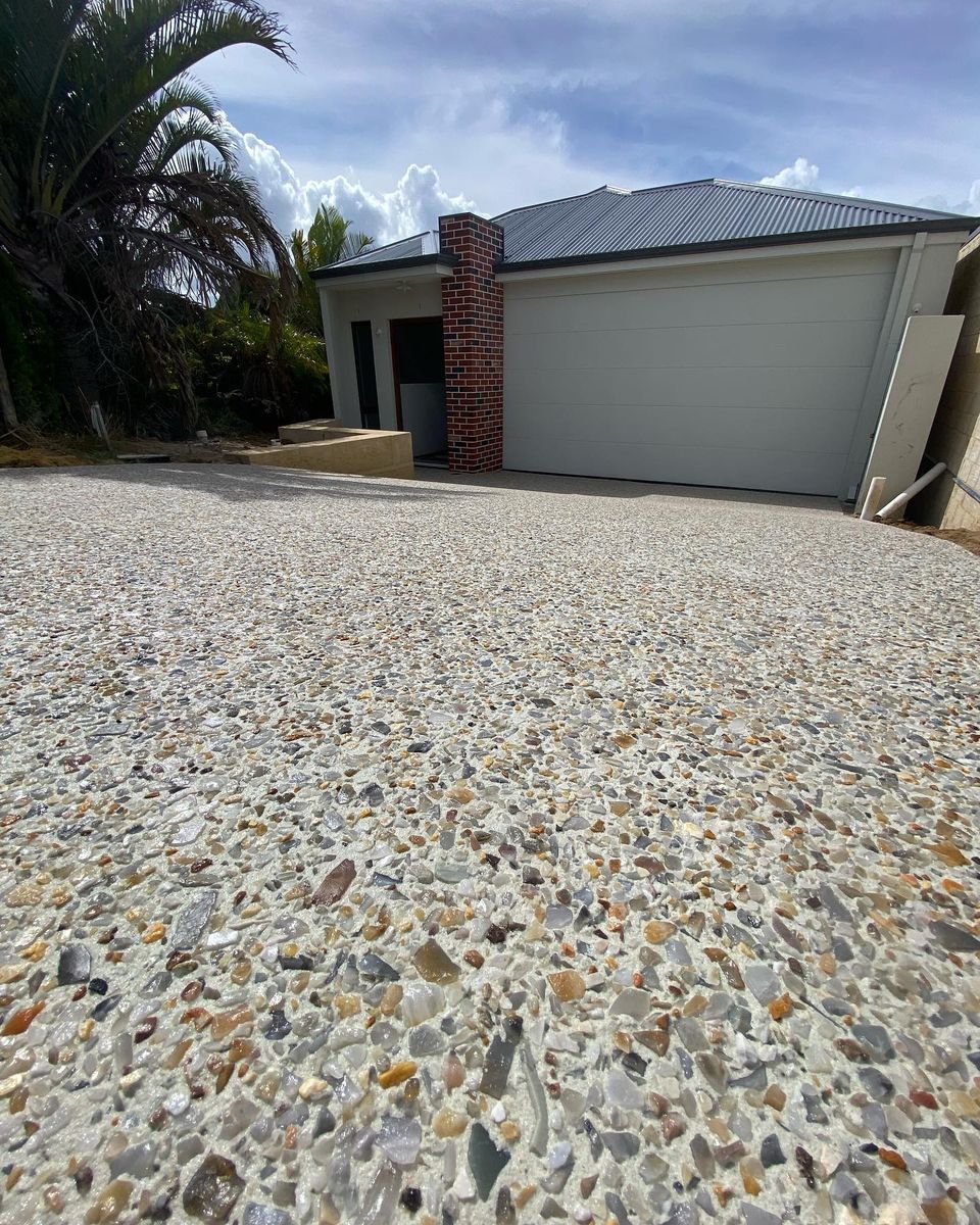White exposed aggregate concrete driveway mix in Warwick
