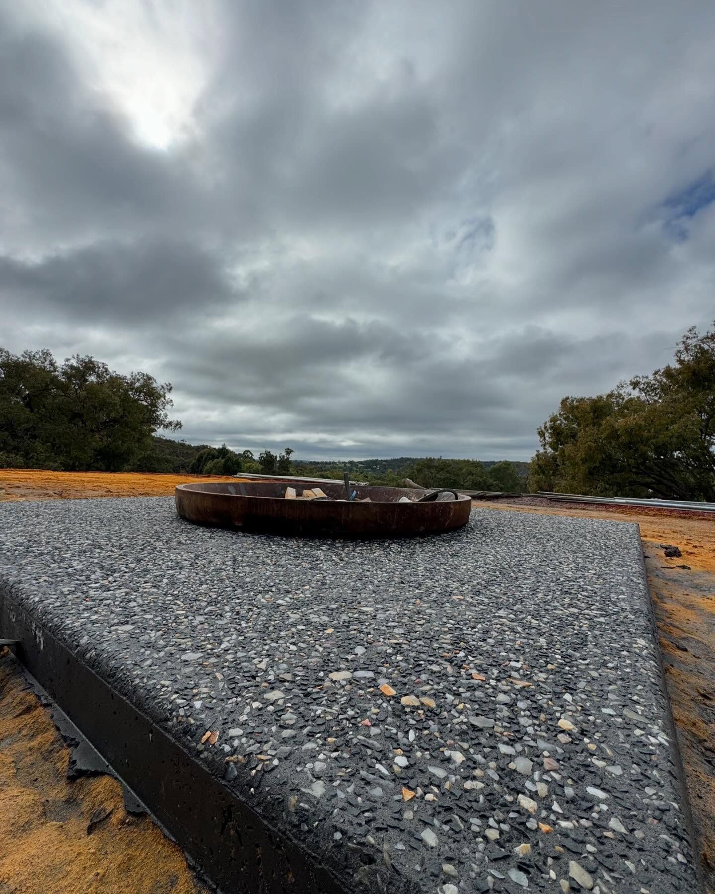Charcoal exposed aggregate fire pit