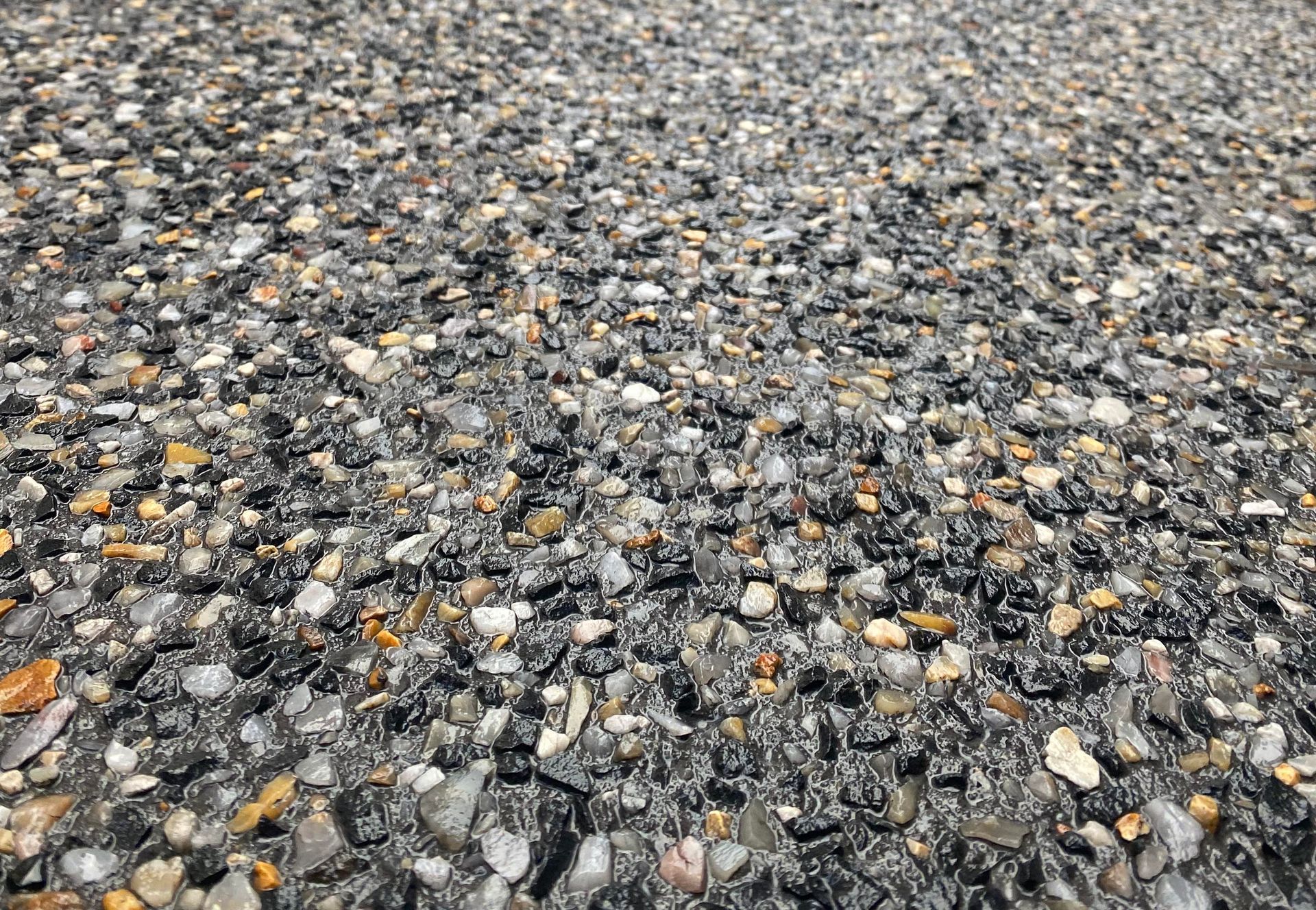 Charcoal exposed aggregate concrete mix application in Perth