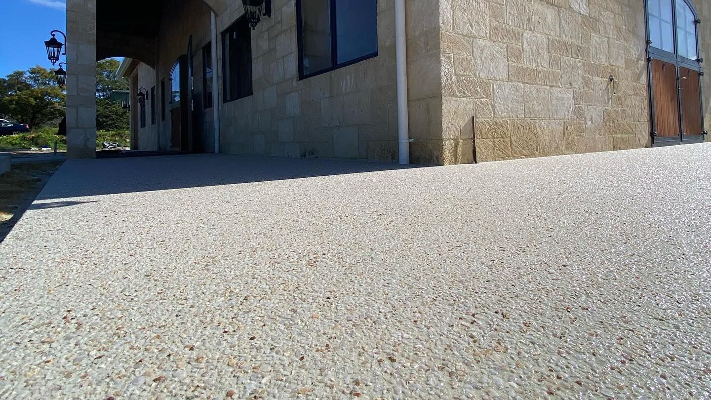 Exposed aggregate around horse stables