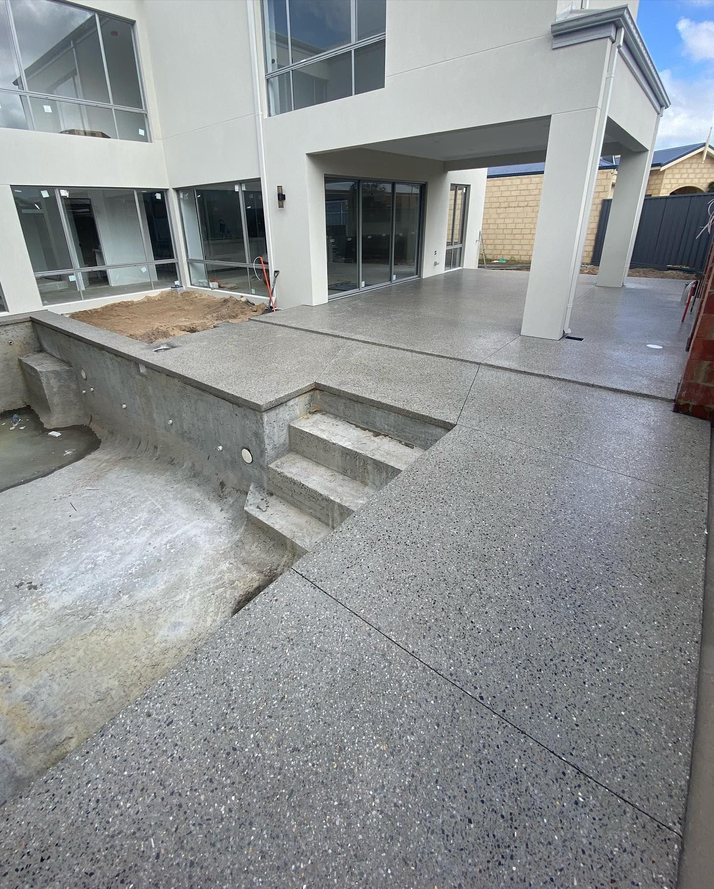 Honed Concrete Stairs and Walkway at front of Perth Home.