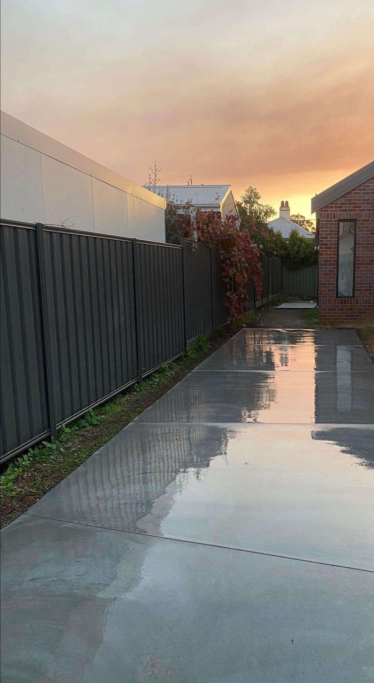 Grey Concrete Driveway application by Handmade Concreting