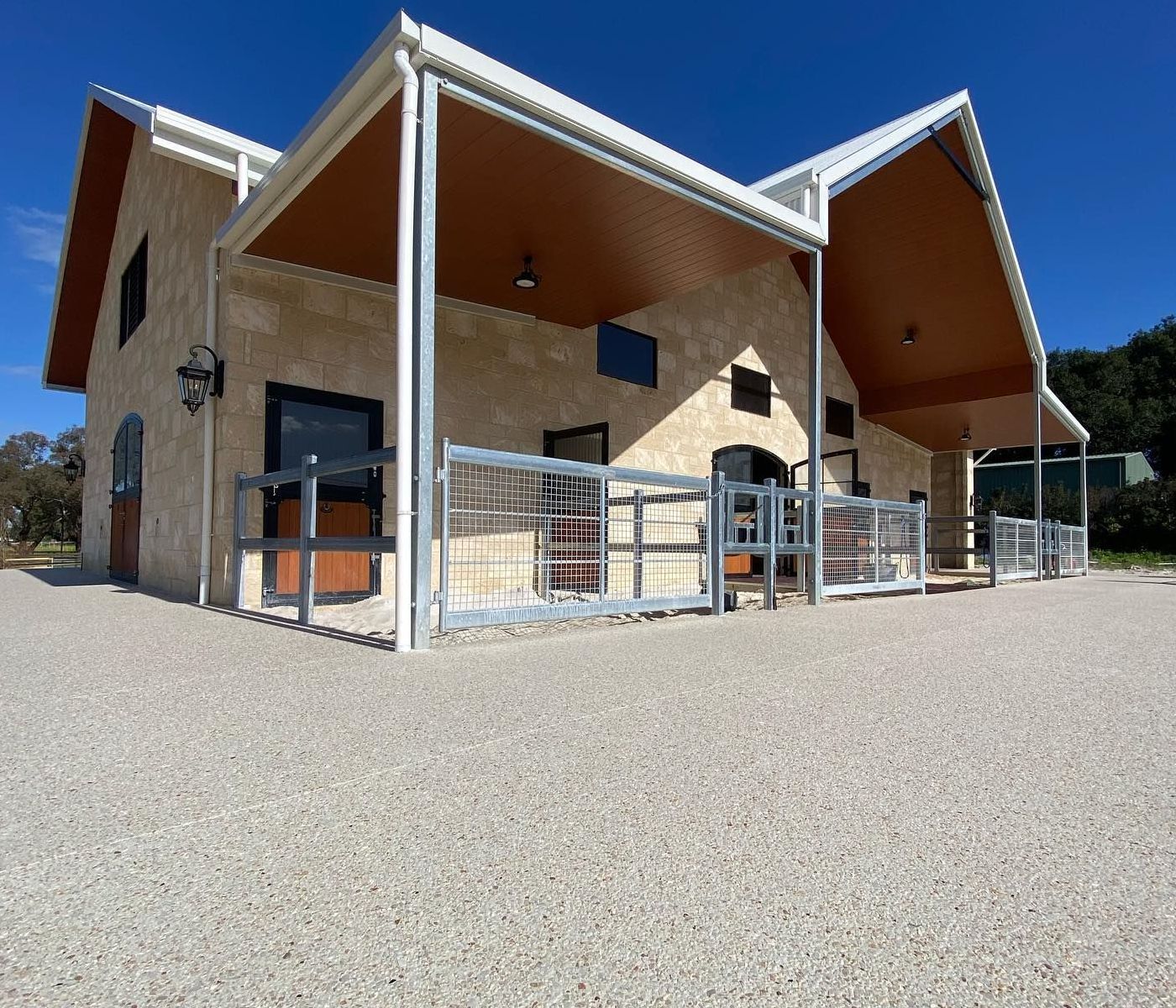 Exposed aggregate around horse stables