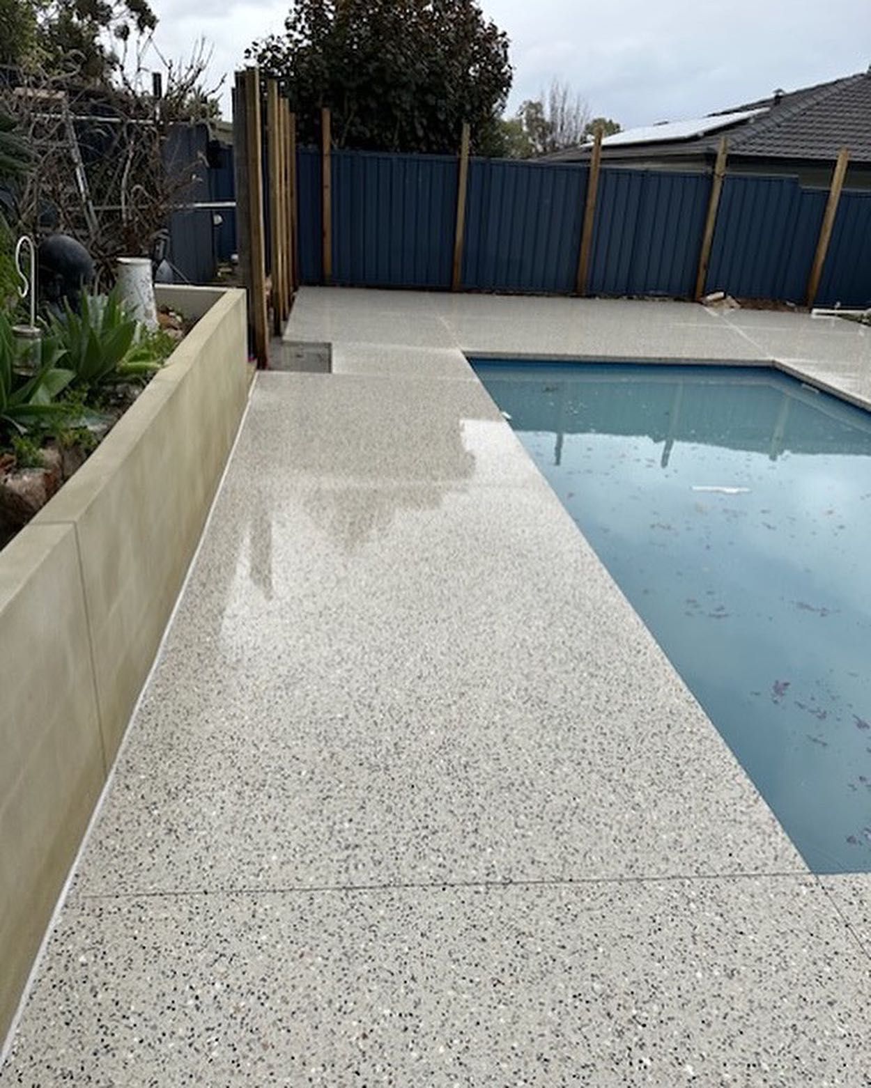 Honed Concrete Pool area in Perth backyard 