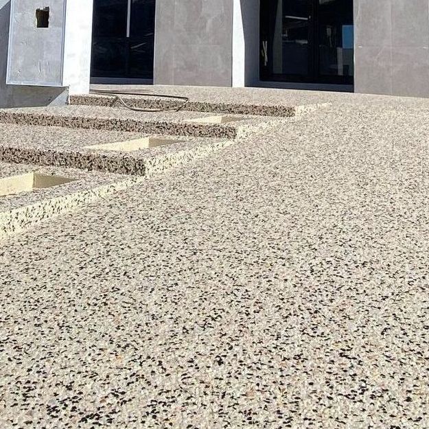 Exposed aggregate staircase leading to the front door on home in Perth