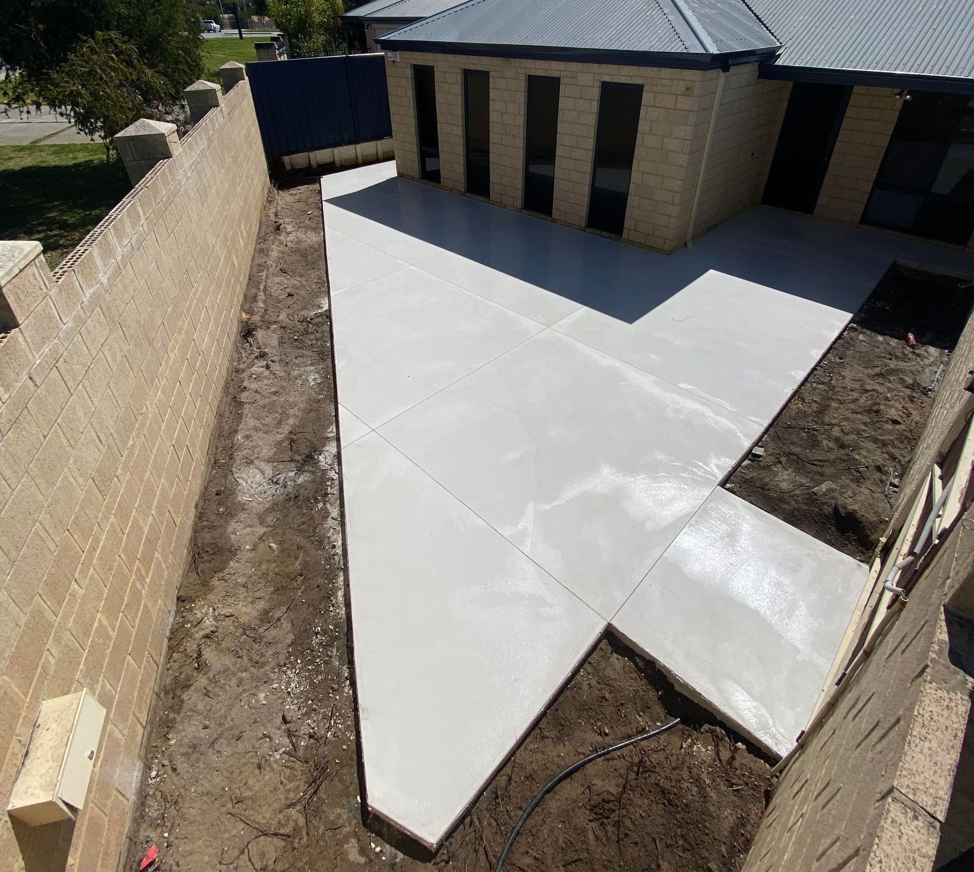 White coloured concrete poured in Perth backyard.