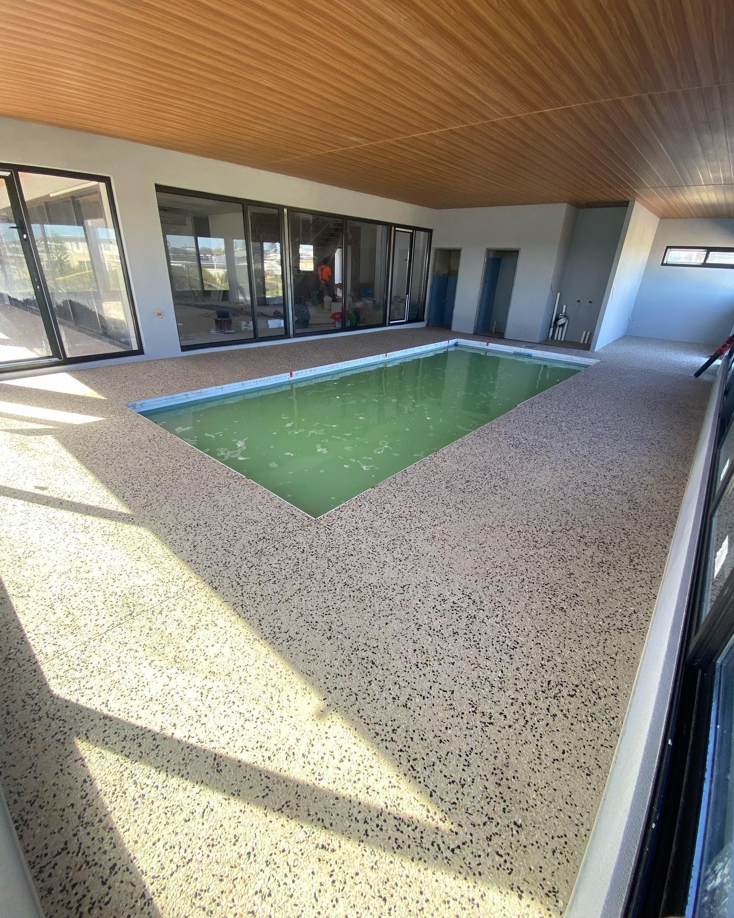 Honed aggregate pool surround services