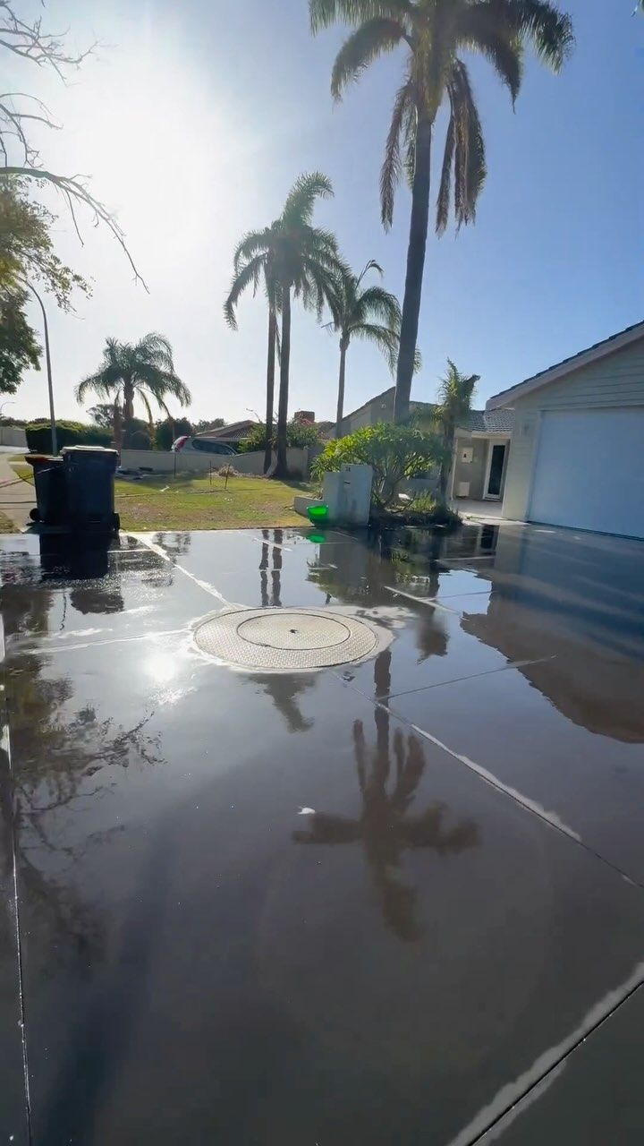 Charcoal coloured concrete for Perth Driveway.