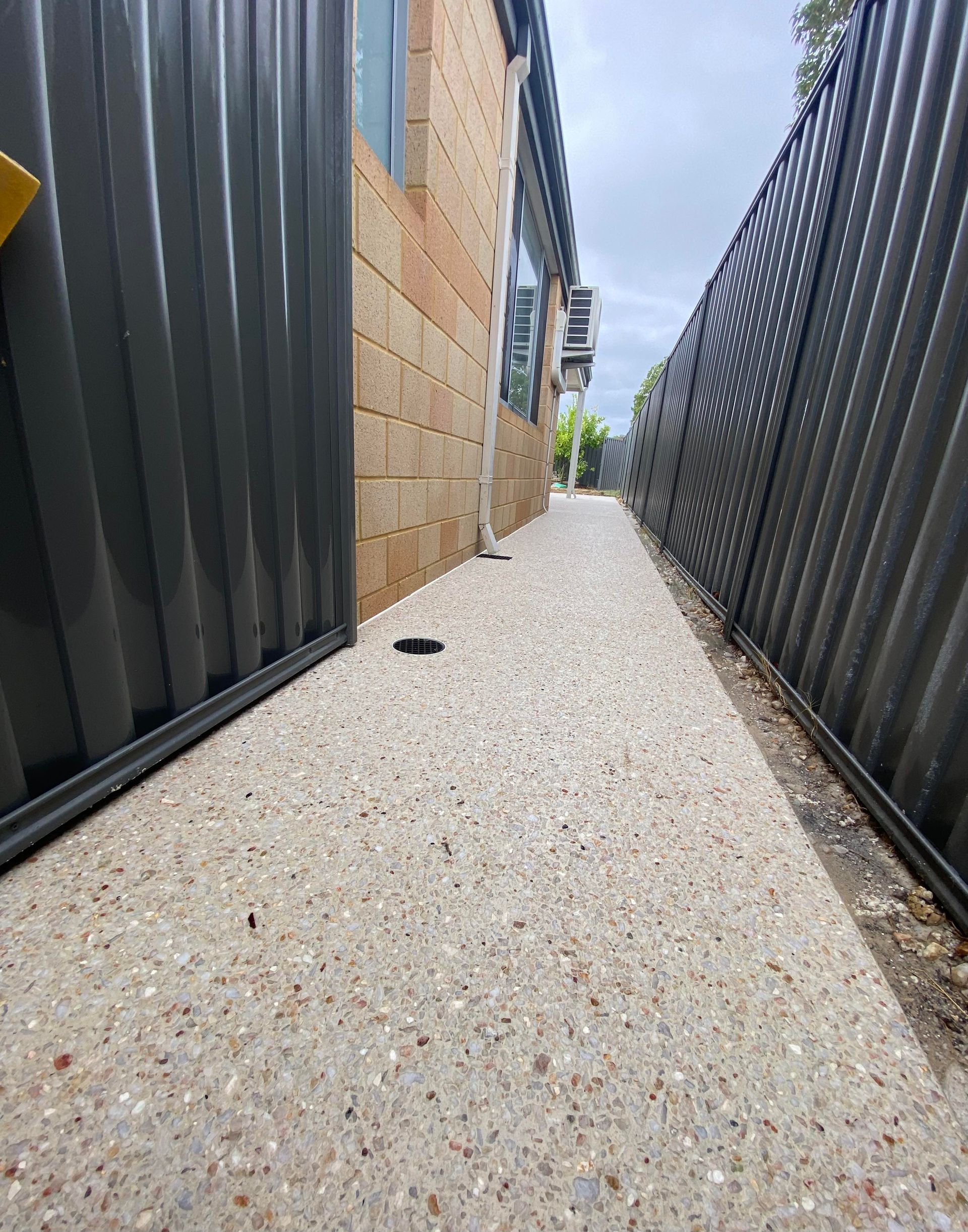 White Exposed Aggregate Pathway  down the dead side of Perth House
