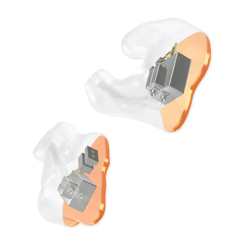 Two clear, custom-molded hearing aids showing internal metallic electronic components inside a beige faceplate.