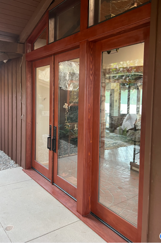Wooden framed glass doors. Exterior view.