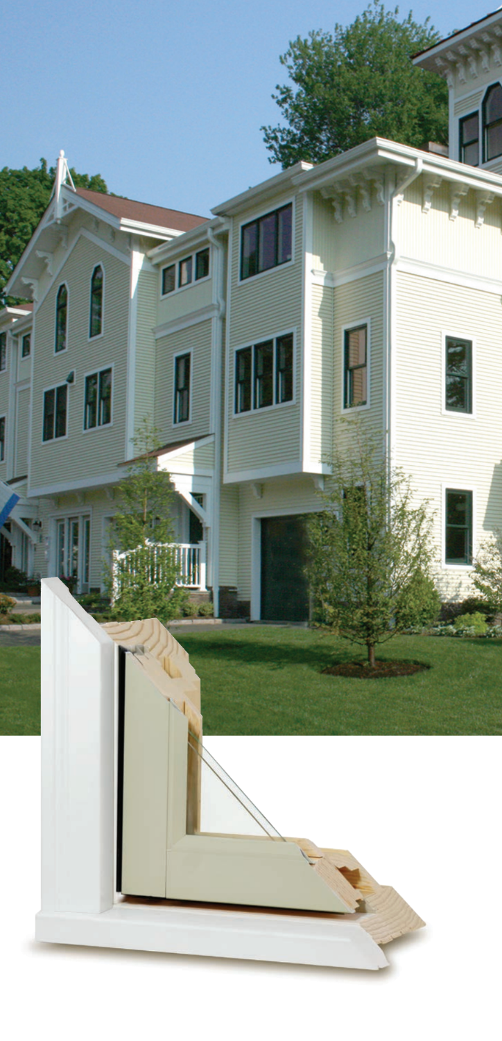 White apartment building with a cutaway of an insulated wall corner in front