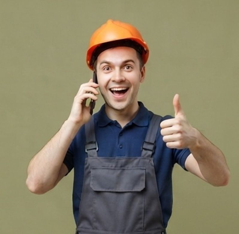 Customer service representative discussing foundation repair options with a client over the phone in Tulare, CA 