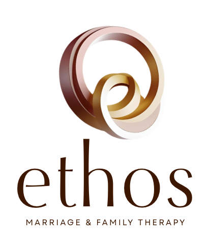 Logo: Abstract gold and brown rings with 