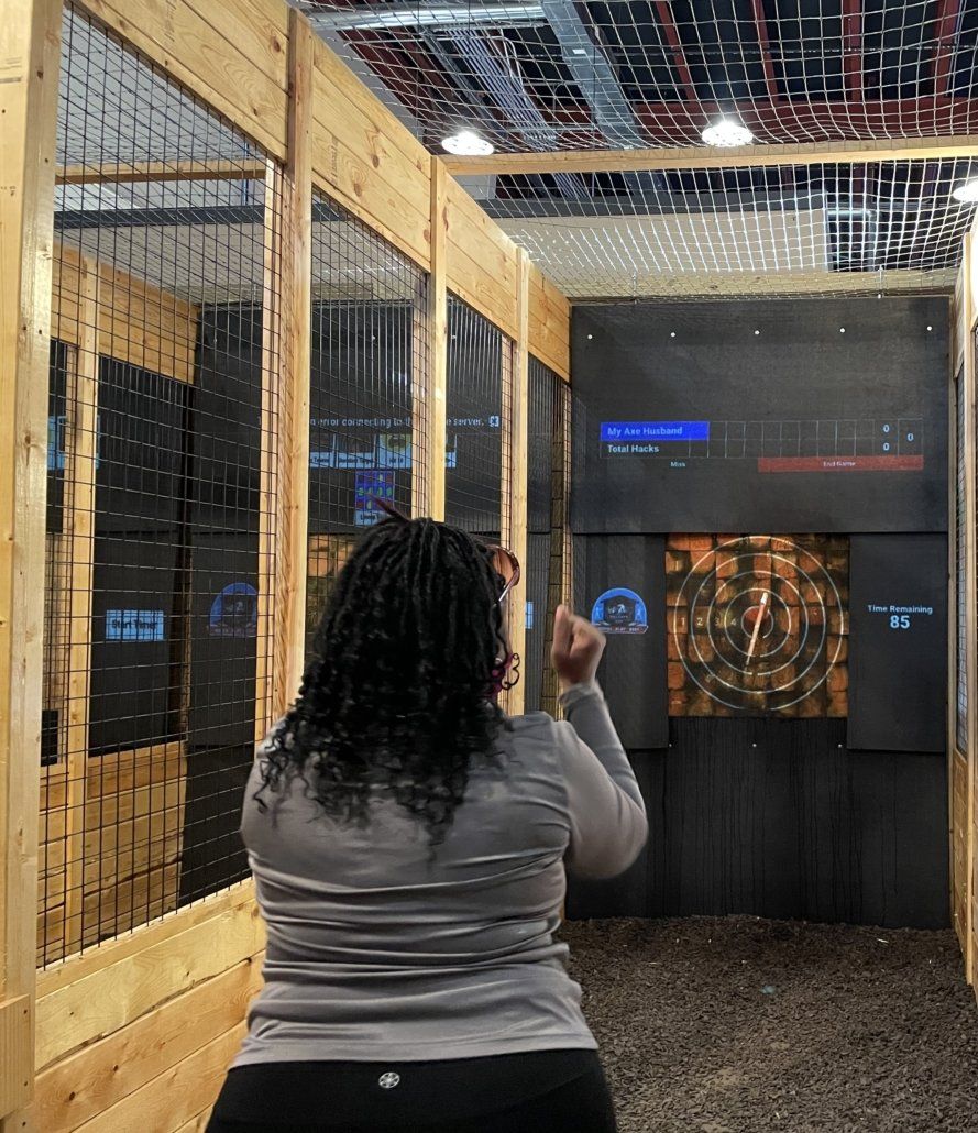 Woman hit bullseye - Canton, MI - The Tailgate Garage