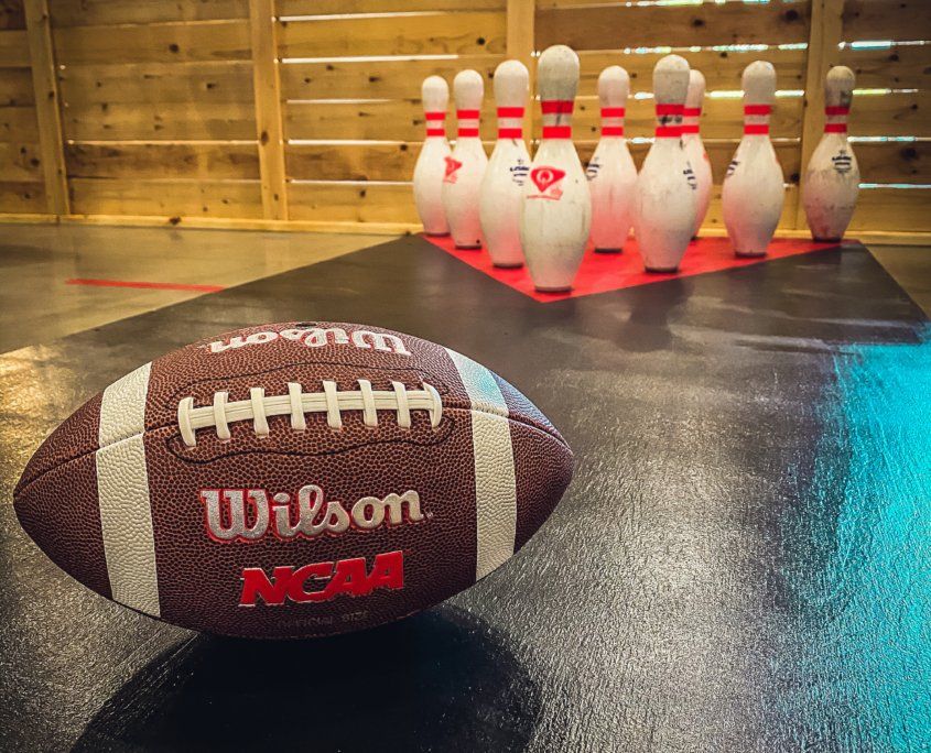 Football and bowling pins - Canton, MI - The Tailgate Garage