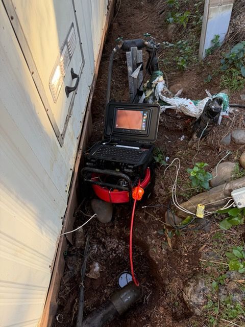 The inside of a moving truck filled with boxes and blankets.