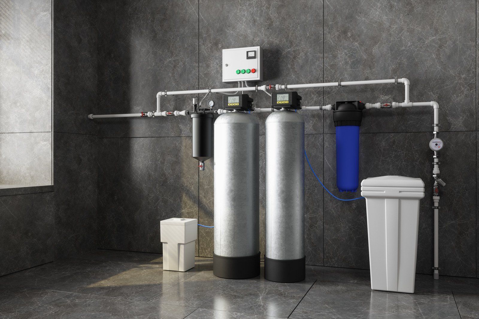 Water filtration system with tanks, filters, and a control panel against a gray wall in a utility room.