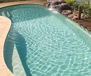 crystal clear swimming pool with built in steps