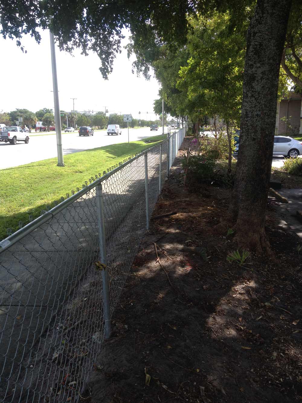 Galvanized Parking Lot Perimeter — Sunrise, FL — First Class Fence & Rail, Inc.
