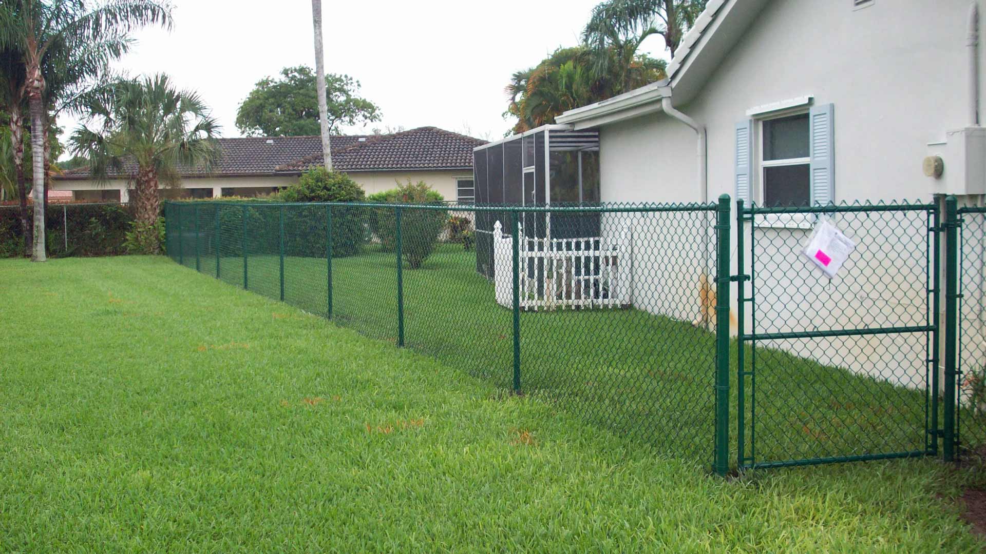 Chain Link Green Vinyl Residential — Sunrise, FL — First Class Fence & Rail, Inc.