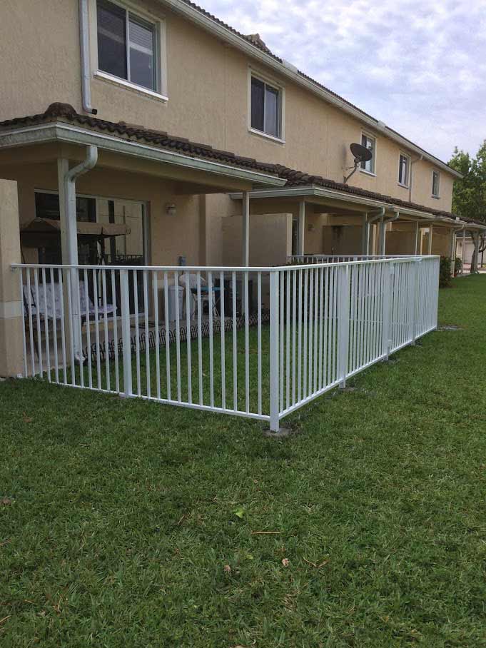White Handrail Yard Fence — Sunrise, FL — First Class Fence & Rail, Inc.