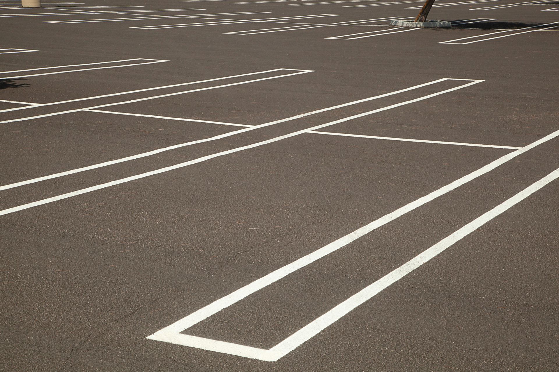 A parking lot with white lines on it