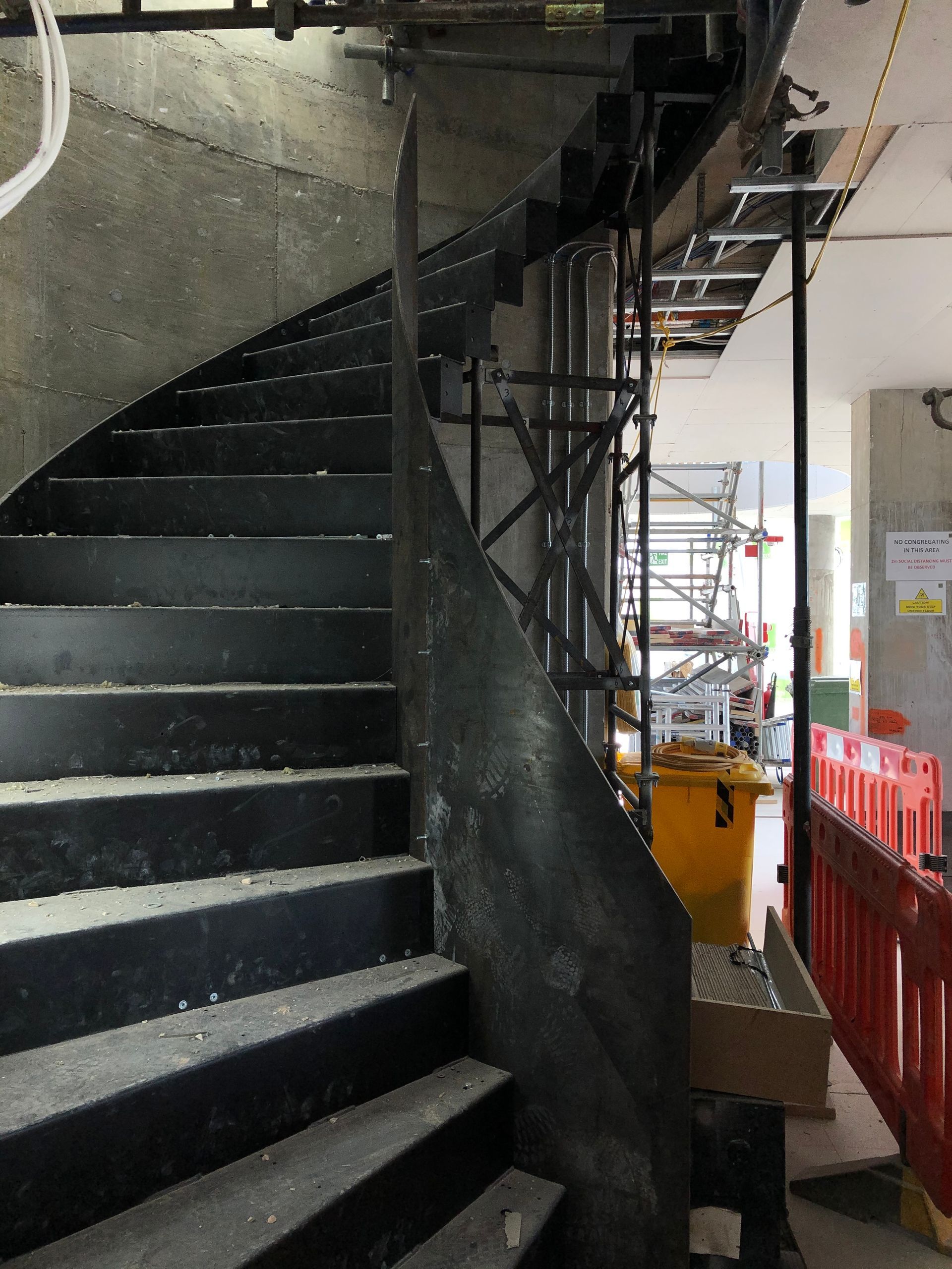 armstrong campbell architects site construction photograph of steel staircase