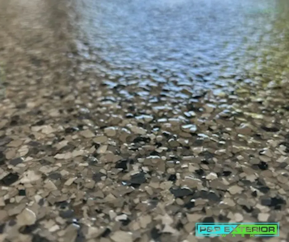 A close up of a concrete floor with a logo that says per exterior