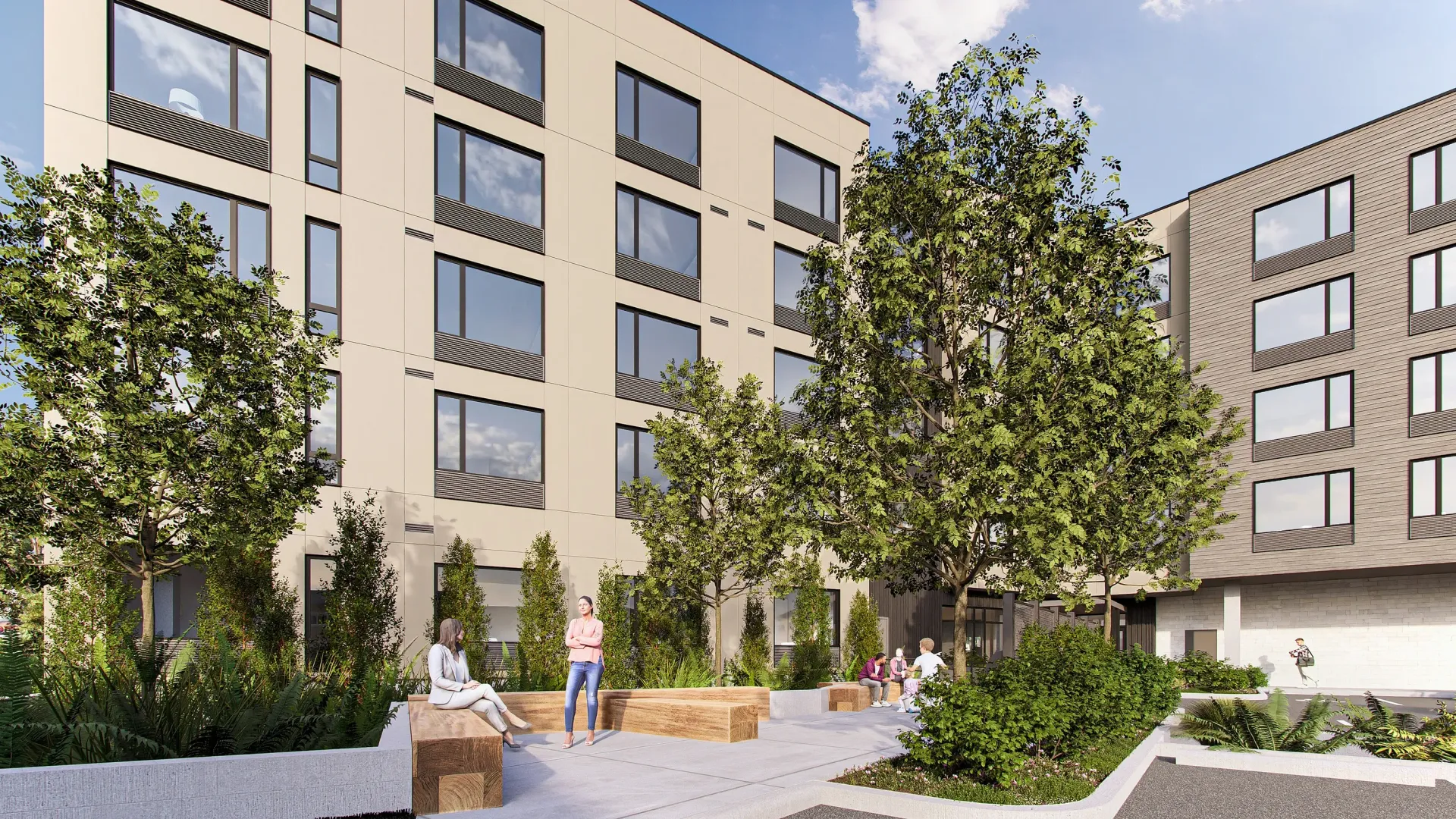 Exterior courtyard and building facade with seating areas and landscaping.
