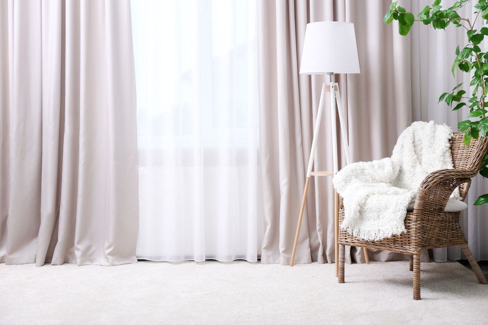 There is a Chair and a Lamp in the Room — Catrina's Custom Curtains & Blinds in Toukley, NSW