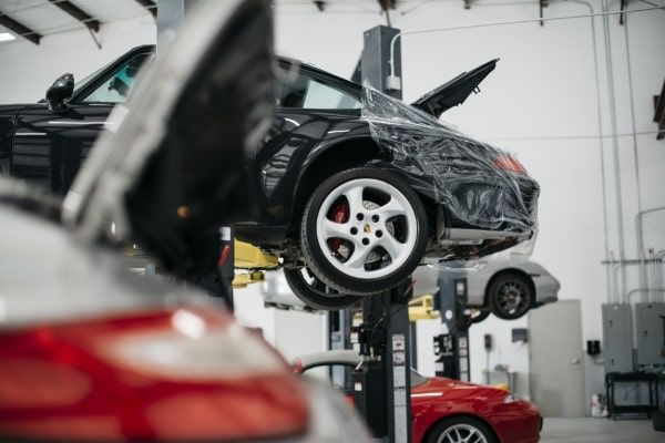 Car Lifted in The Garagisti's Service Bay