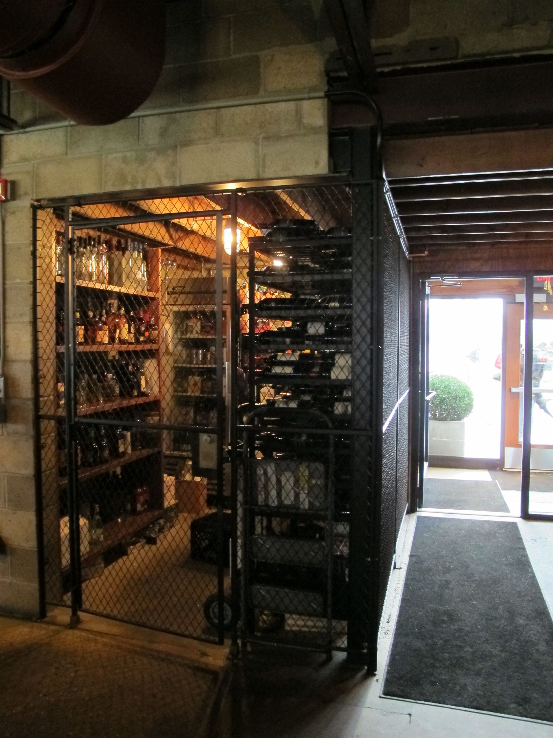 A store with a staircase leading up to the second floor