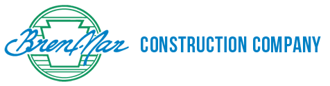 A blue and green logo for a construction company