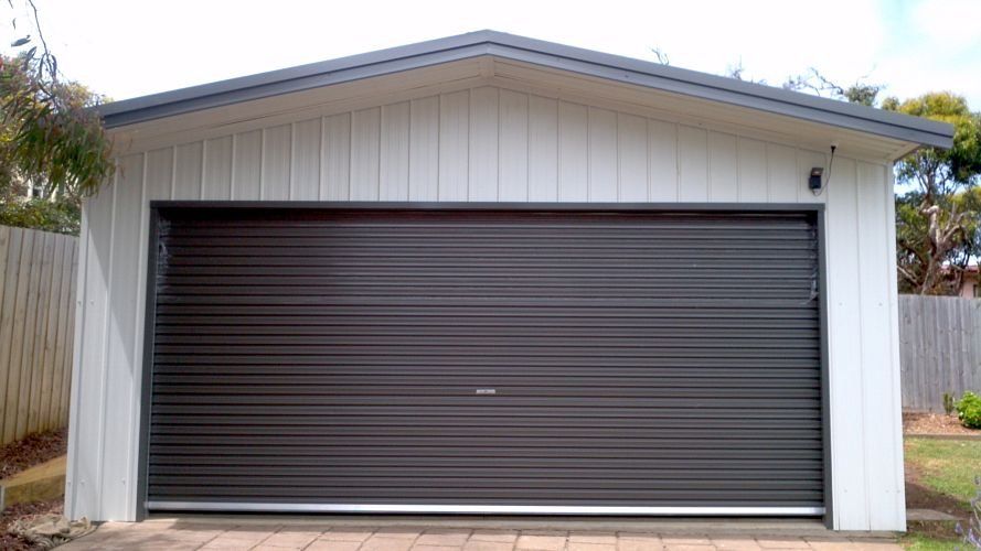 custom white shed with black door